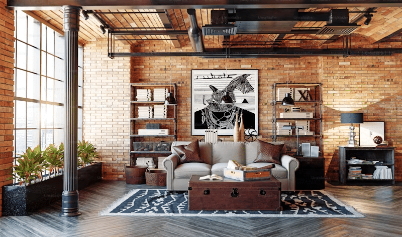Industrial loft living area with brick walls and huge windows